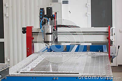 Industrial metal detail on production factory of CNC machine lathes Stock Photo