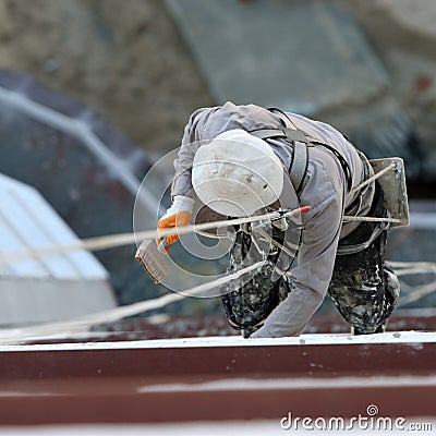 Industrial mountaineering worker (painter) Stock Photo