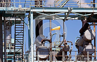 Industrial Petroleum Refinery Plant Smokestacks and Piping Stock Photo