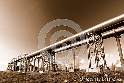 Industrial pipelines on pipe-bridge Stock Photo