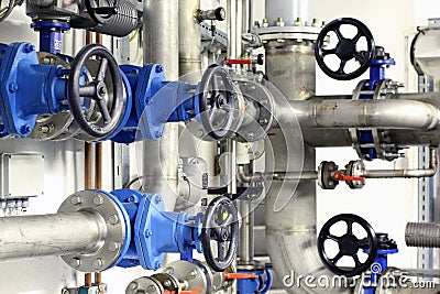 Industrial pipes and valves Stock Photo