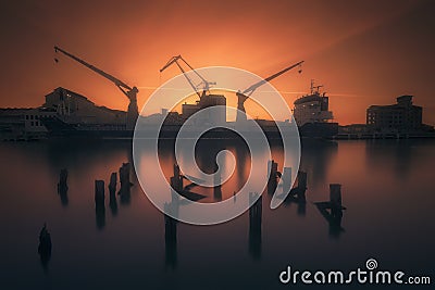 Industrial port with ship and cranes in Zorrozaurre Stock Photo