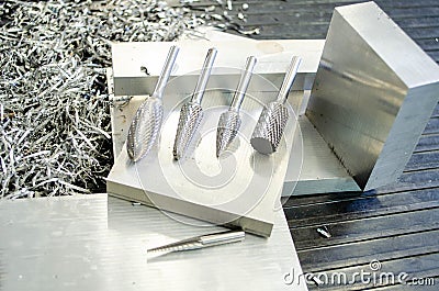 Industrial precision tools for metalworking industry. CNC cutters and drills. Stock Photo