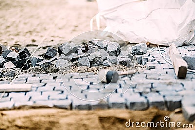 Industrial road pavement. Construction site, landscaping of sidewalk and terrace details Stock Photo