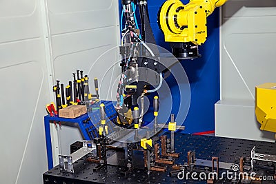 Industrial robot, close up of metal processing Stock Photo