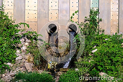 Industrial sewage dumped into rivers Stock Photo