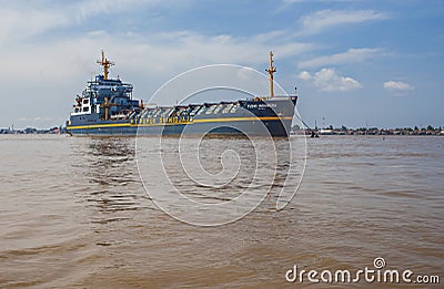 Industrial ship in the middle of Musi River, Palembang, Indonesia. Editorial Stock Photo