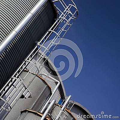 Industrial tanks and buildings Stock Photo