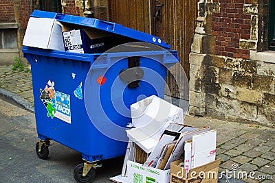 Industrial urban city street with trash and garbage dumpsters in Ghent, Belgium, Europe Editorial Stock Photo