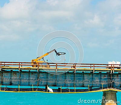 Industrial vehicle on a bridge in Florida Keys Stock Photo