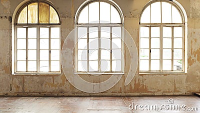 Industrial vintage interior with bright light coming through windows. Stock Photo