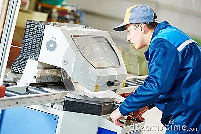 Industrial worker with buzz saw circular blade for cutting metal Stock Photo