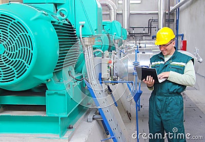 Industrial worker with notebook Stock Photo
