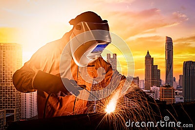 Industrial worker welding steel structure Stock Photo