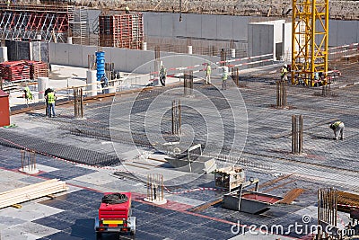 Industrial workers preparing construction formwork Stock Photo