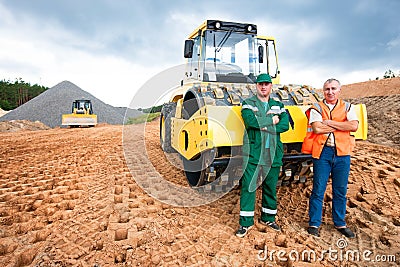 Industrial workers during road works Stock Photo