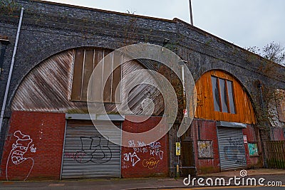 Industrial workshops under the railway arches Editorial Stock Photo