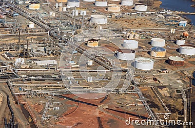 Industrial zone of industrial pipelines an oil refinery plant the equipment of oil refining Stock Photo