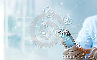 Industry 4.0 concept, Businessman using smartphone with icon tar Stock Photo