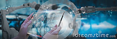 Industry engineer in factory,using smart tablet glass device,control automated robot arm machine learning operation,concept Stock Photo