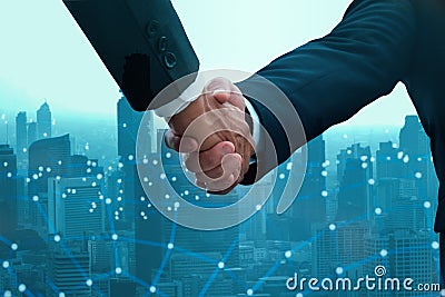 Industry investment and telecommunication business concept, business people team join and handshake and negotiate for mergers and Stock Photo