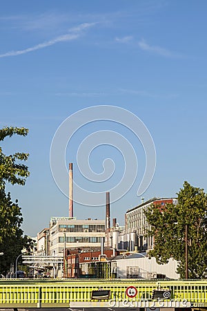 Industry park in Frankfurt hoechst with tank and chimney under blue sky Editorial Stock Photo