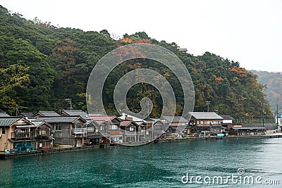 Ine Boathouse is traditional Fisherman Village on a rainy day of Kyoto. Stock Photo