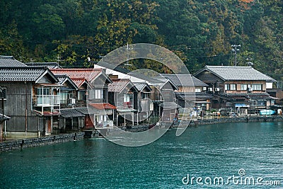 Ine Boathouse is traditional Fisherman Village on a rainy day of Kyoto. Stock Photo