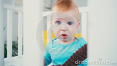 infant boy sitting in blurred baby Stock Photo