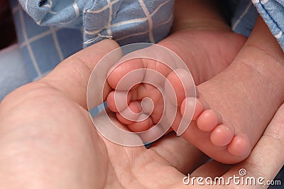 Infant feet Stock Photo