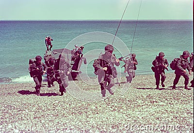 infantry soldiers landed on a beach in the Atlantic Ocean in October 1982, six months before the Malvinas War of April 2, Editorial Stock Photo