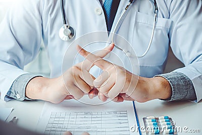 Infectious doctor alert Warn various contraindications for patients Stock Photo