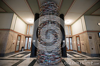 Infinite tunnel of books, also called an endless tower, book tower in the public library of Prague Editorial Stock Photo