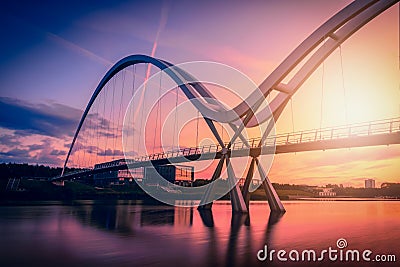 Infinity Bridge on dramatic sky at sunset in Stockton-on-Tees, U Stock Photo