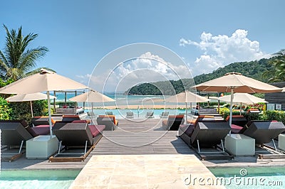 Infinity pool overlooking Cherating Beach, Kuantan, Malaysia Stock Photo