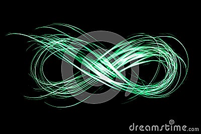 Infinity sign created by neon freeze light on a black background Stock Photo