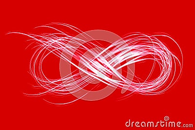 Infinity sign created by neon light on a red background Stock Photo
