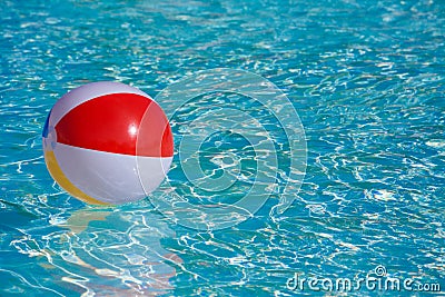 Inflatable colorful ball floating Stock Photo