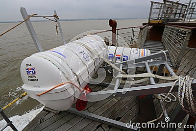 Inflatable liferaft in canister on board ship Editorial Stock Photo