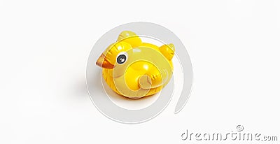 Inflatable mini yellow chicken or duckling on white background, pool float party. Flat lay copy space. Trend Inflatable Children Stock Photo