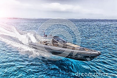 Inflatable motor boat in formentera, spain Stock Photo