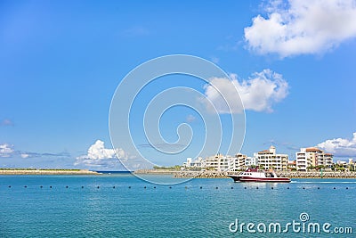 Inflatable slide for water sports, jet ski and motor boating in the Hamakawa fishing port in the vicinity of the American Village Editorial Stock Photo