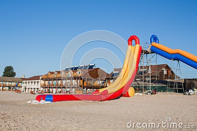 Inflatable water slide on the beach Editorial Stock Photo