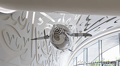 An inflated balloon with propellers in the form of a dolphin flies inside the Museum of The Future in Dubai city, United Arab Editorial Stock Photo