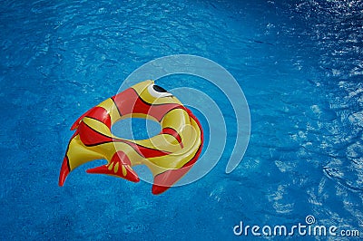 Inflated Toys In A Swimming Pool Stock Photo