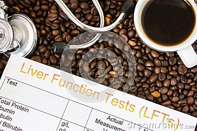 Influence of coffee or caffeine on liver functions, enzymes, activity. Result of liver function test examination near mug with cof Stock Photo