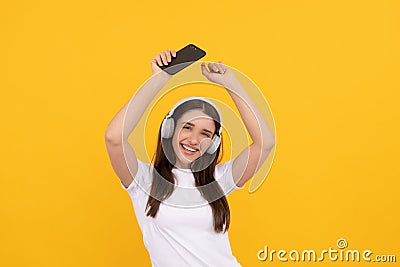 influencer blogging. happy dancing girl in headphones. webinar in wireless headset. Stock Photo