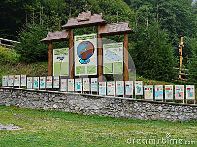 Information corner in the Carpathians with signs indicating important information for tourists Editorial Stock Photo