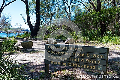 Information guidance sign to the tranquil, white-sand Murrays Beach in Jervis Bay, Booderee National Park, NSW, Australia Editorial Stock Photo