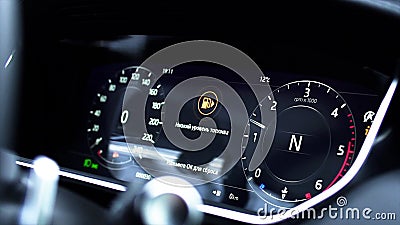 Information panel on a car - close up empty petrol, gasoline gauge dash board in car with digital warning sign of run Stock Photo